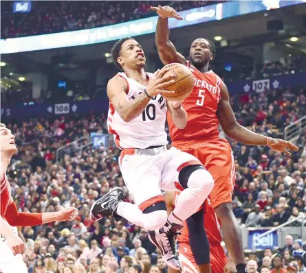  ?? (AP FOTO) ?? NOT ENOUGH. DeMar DeRozan set a career-high with his 18th 30-plus-point game of the season but his 36 points weren’t enough to lift the Raptors over the Rockets.