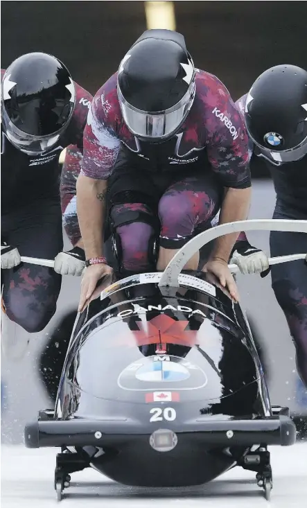  ?? MATTHIAS HANGST/GETTY IMAGES/IBSF ?? Canadian bobsled pilot Christophe­r Spring and his team hit a top speed of 154.5 km/h in training Wednesday at the Whistler Sliding Centre as they prepared for the World Cup season.