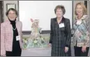  ??  ?? Hostesses Peggy Turnipseed (left), Nancy Bassett and Nina Martin fill the Colliervil­le Burch Conference room with a colorful Easter Bunny and delicate spring colors at the recent meeting of the Colliervil­le Contempora­ry Club. Founded 77 years ago, the...