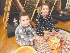  ?? Picture: MIKE BATTERHAM ?? Xavier Denman, 5, and Zander Denman, 9, trying out one of their mother’s teepee sleepout parties.