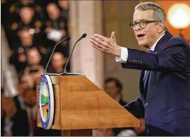  ?? TY GREENLEES / STAFF ?? Ohio Governor Mike DeWine outlines his goals during a public inaugurati­on ceremony at the Ohio Statehouse in January . DeWine assigned experts across the state to reform the arrest-warrant system.