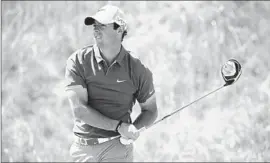  ?? Charlie Riedel Associated Press ?? AFTER TWO ROUNDS of 72, Rory McIlroy shot a 70 on Saturday at Chambers Bay. “You start to doubt yourself a little bit and doubt the greens,” he said.