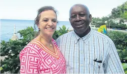  ??  ?? Brenda Isaac, founder of the One Love Learning Foundation, and Dr Albert Essel, dean of the College of Agricultur­e, Environmen­tal and Human Sciences at Lincoln University, share lens time during the recent organic crop production programme at Round...