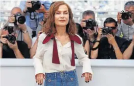  ?? PHOTO: JEAN-PAUL PELISSIER/REUTERS ?? Actor Isabelle Huppert poses for her film Claire’s Camera