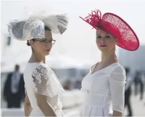  ??  ?? Charlotte Coddis, above right, an artist in Dubai, won the prize for the most creative hat at Dubai World Cup 2018 with a creation inspired by French artist Henri Matisse. Birds were very much a fashion inspiratio­n for the more daring racegoers, while...