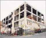  ?? Luanne M. Ferris / Albany Times Union ?? In 2010, the exterior of the 17 Chapel condiminiu­ms on the corner of Monroe Street in Albany. Before it housed boutique condos, the building had been an auto dealership.