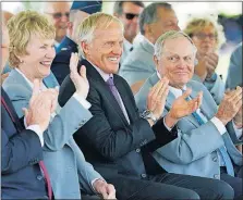  ?? [ADAM CAIRNS/DISPATCH] ?? From right, Jack Nicklaus and Greg Norman applaud as Barbara Nicklaus is introduced during the honoree ceremony for the Memorial Tournament at Muirfield Village Golf Club on Wednesday.