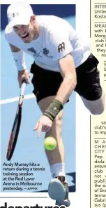  ?? AFPPIX ?? Andy Murray hits a return during a tennis training session at the Rod Laver Arena in Melbourne yesterday. –