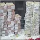  ?? HT PHOTOS ?? Currency notes and gold bars found in Piyush Jain’s house in Kannauj.