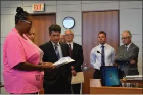  ?? BRIANA CONTRERAS — THE MORNING JOURNAL ?? Nancy E. Burnett, the mother of Alia Bailey, speaks on behalf of her daughter in front of the court before Donald J. Buchs, 25, of Vermilion, was sentenced to 11 years in prison for the death of Bailey, who was 6-years-old. She died after suffering injuries from a car crash Jan. 22, 2017, caused by Buchs while he was under the influence of marijuana.