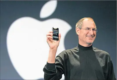  ??  ?? Apple founder Steve Jobs launches the iphone at Macworld Expo in San Francisco on January 9, 2007