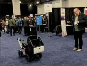  ?? CHANG JUN / CHINA DAILY ?? A visitor to the CES Media Day on Wednesday looks at one of the innovation award-winning products on display. CES 2023 kicks off Thursday in Las Vegas.