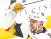  ?? Nuccio DiNuzzo / Associated Press ?? Golden Knights defenseman Shea Theodore celebrates his overtime goal in Chicago.