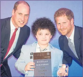  ??  ?? SUPPORTIVE: William and Harry at this year’s Diana Awards. Below, Harry with one of the children helped by Sentebale, the charity he co-founded