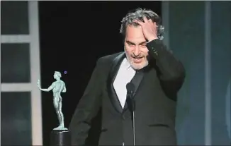  ?? Robert Gauthier Los Angeles Times ?? JOAQUIN PHOENIX accepts his Actor for “Joker.” Will a lead actor Oscar be next? Bet on it.