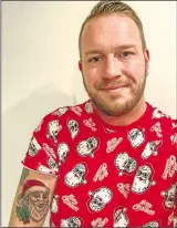  ??  ?? Stuart Weller with his Santa tattoo