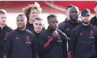  ?? (AFP) ?? Members of Belgian’s national football team pose for a photo near the new Brussels Airlines Belgian Icon “Trident” plane at the Zaventem airport, on Tuesday.