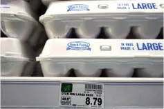  ?? The Associated Press ?? ■ The price of a dozen eggs is seen at a grocery store in Glenview, Ill., on Jan. 10. The ongoing bird flu outbreak has cost the U.S. government roughly $661 million and added to consumers’ pain at the grocery store after more than 58 million birds were slaughtere­d to limit the spread of the virus.