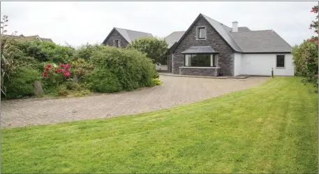  ??  ?? This 5-bedroom house at Ballymakeg­ogue, The Spa,Tralee, is on sale with a price tag of €420,000.