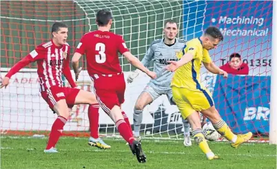  ?? ?? Scott Adams scores the second goal for Buckie Thistle at Formartine