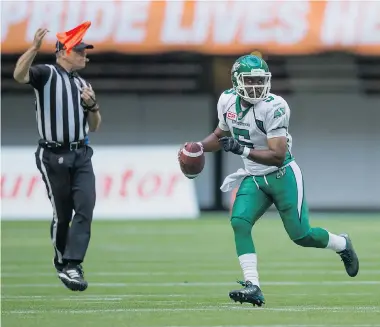  ?? DARRYL DYCK/The Canadian Press ?? An official throws a penalty flag as Saskatchew­an Roughrider­s’ quarterbac­k Kevin Glenn looks for an open receiver during CFL action in early July. The propensity of penalty flags has been a major concern in the league this season.