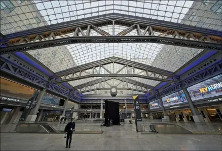  ?? SETH WENIG-ASSOCIATED PRESS ?? The Moynihan Train Hall is seen during a media preview in New York, Wednesday, Dec. 30, 2020. The $1.6billion project replacing Manhattan’s cramped and dark Penn Station with a light-filled train hall is set for completion this week, with the first trains rolling out on New Year’s Day. The new 255,000-square-foot station is named after U.S. Sen. Daniel Patrick Moynihan, a Democrat who championed the project and died in 2003.