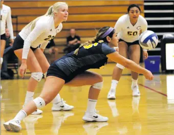  ?? Nikolas Samuels/The Signal ?? Demi Dawson (26) of College of the Canyons dives to hit the volleyball during a home match against L.A. Mission College on Wednesday. College of the Canyons won 3-0.