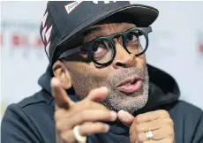  ?? CHIASSON/THE CANADIAN PRESS PAUL ?? Director Spike Lee was in Montreal to show his film BlacKkKlan­sman at the Internatio­nal Black Film Festival and didn’t hesitate to get political.