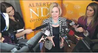  ?? ED KAISER/ EDMONTON JOURNAL ?? NDP Leader Rachel Notley criticized Jim Prentice’s refusal to raise taxes for corporatio­ns along with the rest of Albertans, saying families shouldn’t bear the burden of the fiscal crisis alone.