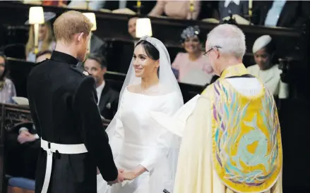  ??  ?? “I now declare you husband and wife”-Prince Harry and Meghan Markle are officially married.