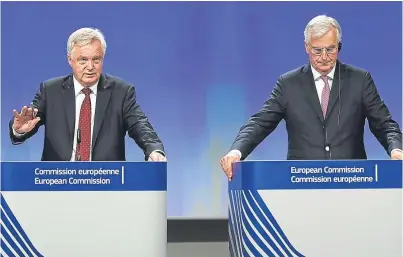  ?? Picture: Getty. ?? Brexit secretary David Davis and EU chief negotiator Michel Barnier.