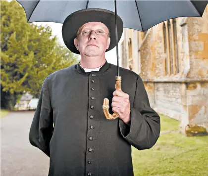  ?? DES WILLIE/BBC ONE ?? Mark Williams has played a variety of colorful roles, but none quite like the title role in “Father Brown.”