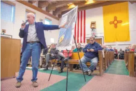  ??  ?? State Rep. Matthew McQueen, an attorney representi­ng the Santa Fe Gateway Alliance, argues against the Flying J truck stop proposed at Interstate 25 and N.M. 14 at a county government hearing Thursday.