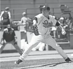  ?? VERA NIEUWENHUI­S/AP ?? Long Island Ducks pitcher Jake Fisher throws during a 2019 Atlantic League game in Central Islip, N.Y. A portion of the Atlantic League season will see a 12-inch greater distance between the mound and home plate.