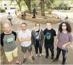  ??  ?? U of S Prof. Scott Bell, from left, Prof. Kevin Stanley and research students Alita Mann, Kristof Mercier and Ix Lahiji are studying whether how much people walk is affected by where they live. The Pokemon Go craze could mean they find more walkers...