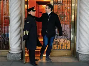  ?? The Associated Press ?? COURT FILINGS: Michael Cohen, former lawyer to President Donald Trump, leaves his apartment building Friday on New York’s Park Avenue. Cohen was in touch as far back as 2015 with a Russian who offered “political synergy” with the Trump election campaign and proposed a meeting between the candidate and Russian President Vladimir Putin, the special counsel said Friday.
