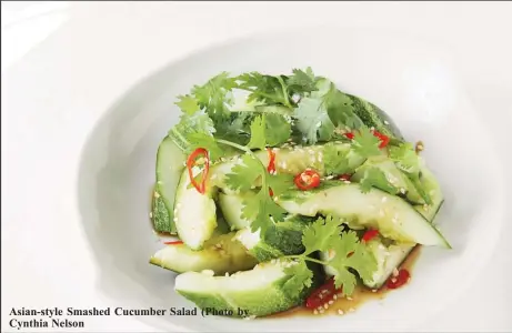 ??  ?? Asian-style Smashed Cucumber Salad (Photo by Cynthia Nelson