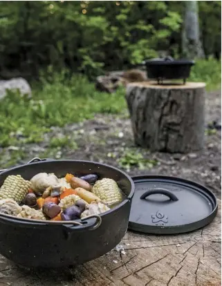  ??  ?? With a Dutch oven and some hot coals, your menu options are endless.