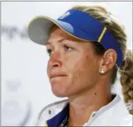  ?? CHARLIE NEIBERGALL — THE ASSOCIATED PRESS ?? Europe’s Suzann Pettersen, of Norway, looks on during a news conference in West Des Moines, Iowa on Wednesday. Pettersen has pulled out of this weekend’s Solheim Cup because of a back injury.