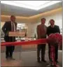  ?? GARY PULEO — DIGITAL FIRS MEDIA ?? King of Prussia Mall manager Bob Hart, left, leaves the symbolic ribbon tying duties at the mall expansion celebratio­n to U.S. Rep. Brendan Boyle, D-13, and Simon Properties President Rick Sokolov Thursday, Aug. 19.
