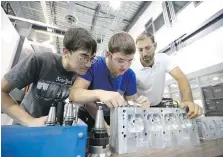  ??  ?? St. Clair College engineerin­g students Michael Szentmiklo­ssy and Justin Klassen, with professor Daniele DeFrancesc­hi during class.