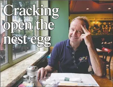  ?? (AP/Charles Rex Arbogast) ?? Chicago Alderman Tom Tunney poses inside his main Ann Sather restaurant in Chicago. Social distancing requiremen­ts have curtailed revenue and the PPP loan Tunney got was quickly spent paying staff at the restaurant­s that are neighborho­od breakfast and brunch stalwarts.