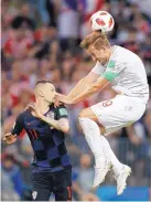  ?? FRANCISCO SECO/ASSOCIATED PRESS ?? England’s Harry Kane, right, led his team to the third-place game of the World Cup today against Belgium.