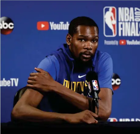  ??  ?? forward Kevin Durant answers questions after an NBA basketball practice, Wednesday, May 30, 2018, in Oakland, Calif. The Warriors face the Cleveland Cavaliers in Game 1 of the NBA Finals on Thursday in Oakland. (AP)