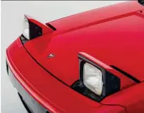  ??  ?? RIGHT Non-original leather trim added during the resto adds a touch of luxury to the MR2’s interior.