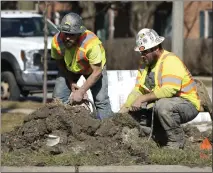  ?? NAM Y. HUH — THE ASSOCIATED PRESS ?? Constructi­on workers in Mount Prospect, Ill., in late February. On Friday, the Labor Department said the U.S. added 303,000jobs in March.