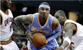  ?? Photograph: Amy Sancetta/AP ?? Carmelo Anthony walks away from the NBA after finishing his career with 28,289 points.