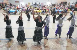  ?? Kin Man Hui / Staff photograph­er ?? Young dancers perform during the 11th annual Lebanese Food Festival atSt. George Maronite Catholic Church. The three-day festival offers a taste of Lebanese culture with food, dance and tours of the church.