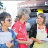  ??  ?? Vanessa Sucich-Coupland getting in the zone with volunteers Lynne McDonald (left) and Yvette Lloyd.