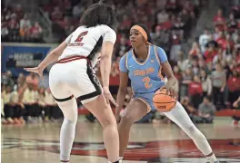  ?? ?? Tennessee forward Rickea Jackson dribbles in front of NC State forward Mimi Collins in the second round of the NCAA Women’s Tournament at James T. Valvano Arena at William Neal Reynolds Coliseum.